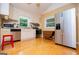 Bright kitchen features white cabinets, stainless steel appliances, and ample counter space at 3258 South Mckoy Rd, Villa Rica, GA 30180