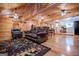 Open floor plan showcasing the living room with wood finishes, plus the kitchen and dining area at 3258 South Mckoy Rd, Villa Rica, GA 30180