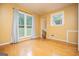Bright room with hardwood floors and natural light filtering through the windows at 3258 South Mckoy Rd, Villa Rica, GA 30180