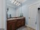 Bright bathroom with double sinks, neutral color palette, and ample counter space at 124 Belford Way, Locust Grove, GA 30248