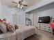 Bedroom features a ceiling fan, overhead lighting and plenty of space at 124 Belford Way, Locust Grove, GA 30248