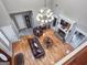 High-ceiling foyer with hardwood floors, decorative chandelier, and open view to the living space at 124 Belford Way, Locust Grove, GA 30248