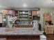 Kitchen with stainless steel appliances, ample cabinet space, and a center island at 124 Belford Way, Locust Grove, GA 30248