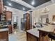 Spacious kitchen with wood cabinets, stainless steel appliances, and an open concept design at 124 Belford Way, Locust Grove, GA 30248
