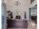 Elegant living room with high ceilings, fireplace, and open floor plan at 124 Belford Way, Locust Grove, GA 30248