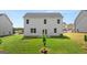 Home features a well-maintained backyard and green space at 178 Aster, Locust Grove, GA 30248