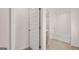 Bright bathroom with a soaking tub and neutral flooring at 178 Aster, Locust Grove, GA 30248