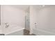 Bright bathroom with double vanity, soaking tub, and a separate shower at 178 Aster, Locust Grove, GA 30248