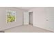 Bedroom features a closet and a large window at 178 Aster, Locust Grove, GA 30248