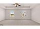 Spacious main bedroom with tray ceiling, neutral carpet, and ample natural light at 178 Aster, Locust Grove, GA 30248