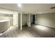 Large finished basement with brick accents, versatile space for recreation or storage at 438 Fedora Nw Way, Atlanta, GA 30331