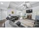 Cozy living room features a fireplace, coffered ceiling, and plenty of seating at 92 Gordon Oaks Way, Moreland, GA 30259