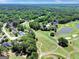 Aerial view of the community highlighting the lush landscaping and golf course at 121 Tamerlane, Peachtree City, GA 30269