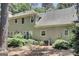 Neutral stucco exterior has a deck, central air, and well-maintained landscaping at 121 Tamerlane, Peachtree City, GA 30269