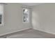 Empty bedroom provides an open and versatile space, ready for customization and ample natural light at 121 Tamerlane, Peachtree City, GA 30269
