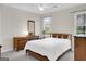 Bedroom with white walls, ceiling fan and a large window at 121 Tamerlane, Peachtree City, GA 30269