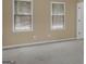 Empty bedroom with neutral walls and two windows at 121 Tamerlane, Peachtree City, GA 30269