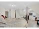 Spacious bedroom with a four poster bed, ceiling fan and work desk at 121 Tamerlane, Peachtree City, GA 30269