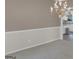 A spacious dining room with neutral walls and plush carpeting at 121 Tamerlane, Peachtree City, GA 30269