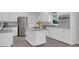 Bright kitchen with center island and stainless steel appliances at 121 Tamerlane, Peachtree City, GA 30269