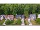 An aerial view of a neighborhood with lush green trees and well-maintained homes at 126 Ardenlee Dr, Peachtree City, GA 30269