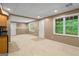 Finished basement includes a kitchenette and ample space for recreation and entertainment at 126 Ardenlee Dr, Peachtree City, GA 30269