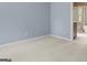 Light-filled bedroom with an en-suite bathroom at 126 Ardenlee Dr, Peachtree City, GA 30269