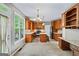 Spacious kitchen boasts granite countertops, tile flooring, and stainless steel appliances at 126 Ardenlee Dr, Peachtree City, GA 30269