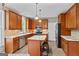 Well-equipped kitchen with stainless steel appliances, granite countertops, and a central island at 126 Ardenlee Dr, Peachtree City, GA 30269