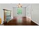 Spacious living room featuring hardwood floors, a fireplace, and open layout at 126 Ardenlee Dr, Peachtree City, GA 30269
