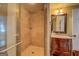 Bathroom featuring a glass door shower and vintage-style vanity at 22 Waters Bridge Cir, Covington, GA 30014