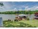 Lakefront property with a private dock and boathouse, surrounded by lush greenery and offering serene waterfront living at 22 Waters Bridge Cir, Covington, GA 30014