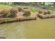 Well-maintained waterfront with retaining wall steps down to the water at 22 Waters Bridge Cir, Covington, GA 30014