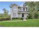 Charming two-story home with a well-manicured front lawn and lush landscaping at 4467 Thornwood Cres, Stone Mountain, GA 30083