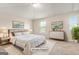 Virtually staged bedroom with a comfortable bed, soft rug, and coordinated decor at 116 Cabin Way, Hampton, GA 30228