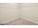 Empty carpeted walk-in closet with wire shelving at 116 Cabin Way, Hampton, GA 30228