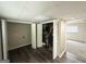 Basement features include gray vinyl flooring and paneled doors at 815 Magna Carta Nw Dr, Atlanta, GA 30318