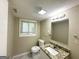 This bathroom has a decorative counter and modern lighting at 815 Magna Carta Nw Dr, Atlanta, GA 30318