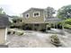 Charming two-story home with driveway and mature trees at 815 Magna Carta Nw Dr, Atlanta, GA 30318