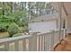 Private backyard with lush landscaping and brick paved patio at 120 Hamilton Glen Ct, Fayetteville, GA 30215