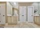 Bright bathroom featuring a soaking tub, double vanity and ample storage space at 120 Hamilton Glen Ct, Fayetteville, GA 30215