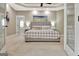 Spacious bedroom featuring neutral decor, trey ceilings, and ensuite access, for a relaxing retreat at 120 Hamilton Glen Ct, Fayetteville, GA 30215
