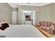 Bright bedroom with a large closet, comfortable seating, and a serene atmosphere at 120 Hamilton Glen Ct, Fayetteville, GA 30215