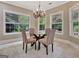 Sunlit breakfast nook with decorative lighting perfect for relaxed meals at 120 Hamilton Glen Ct, Fayetteville, GA 30215
