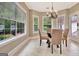 Cozy breakfast nook with natural light and view of the lush backyard at 120 Hamilton Glen Ct, Fayetteville, GA 30215