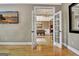 View of the dining room from the living room through elegant French doors at 120 Hamilton Glen Ct, Fayetteville, GA 30215