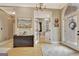 Entryway with French doors, decorative chandelier, and elegant accents at 120 Hamilton Glen Ct, Fayetteville, GA 30215