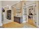 Foyer showing French doors to the office space, and decorative accents at 120 Hamilton Glen Ct, Fayetteville, GA 30215
