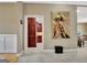 Hallway with access to kitchen and living spaces, featuring neutral walls and trim at 120 Hamilton Glen Ct, Fayetteville, GA 30215