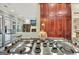 Kitchen cooktop set within large island featuring views of a living room and a breakfast nook at 120 Hamilton Glen Ct, Fayetteville, GA 30215